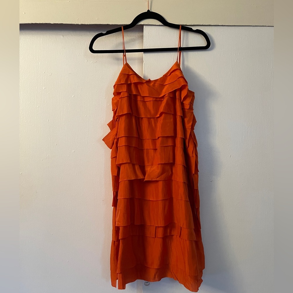 100% silk orange ruffle dress from Stella McCartney